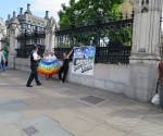 8 Jed and Serge outside Parliament with banner 7Aug15