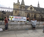 9 Michael Tristi and Mical with their banners outside Parliament