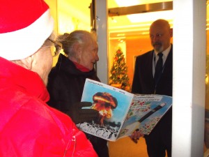 Two Muriel Lesters deliver a Christmas card to Lockheed Martin