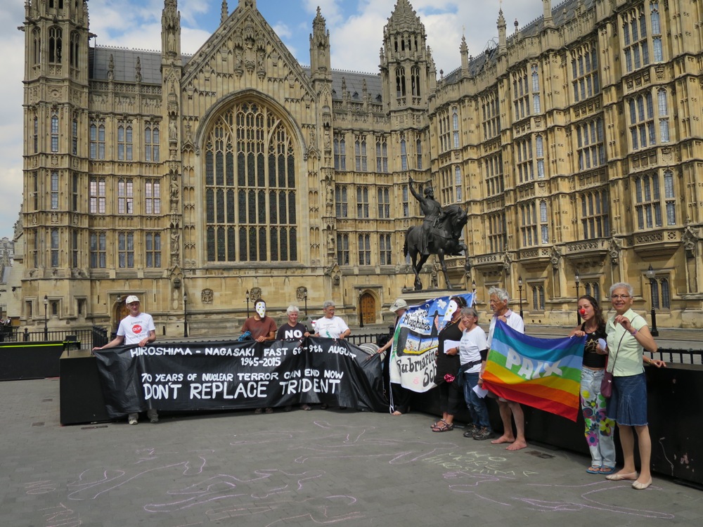 13 Gathered around the banners after die in at HoC 7Aug15